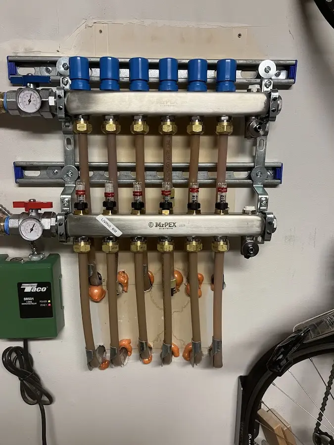 Plumber performing Water Heater Repair at a residential property in Kyle